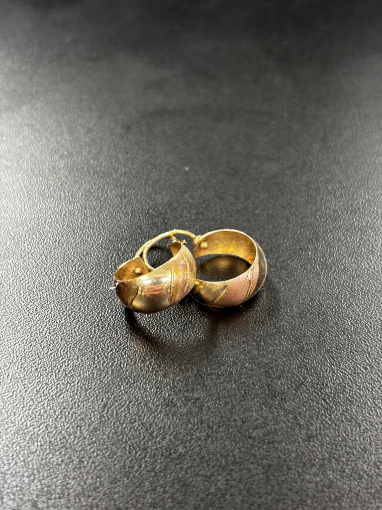 Customer gold hoop earrings mailed for cash payout
